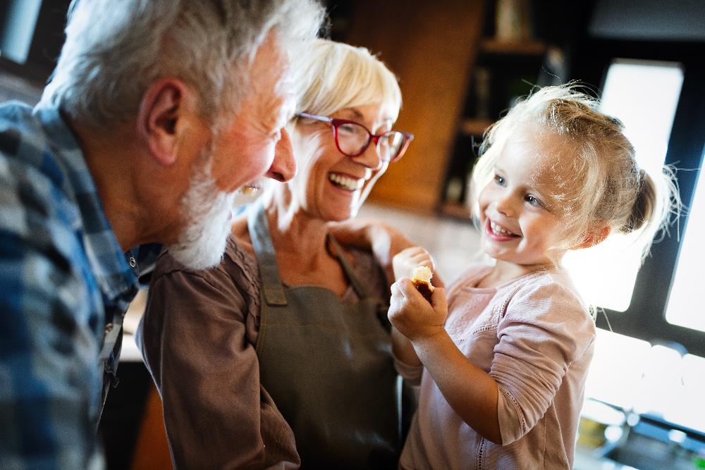 older couple with child smiling | family dentistry white bear lake mn