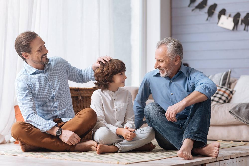 multi generationa of men sitting | children's dentist white bear lake mn