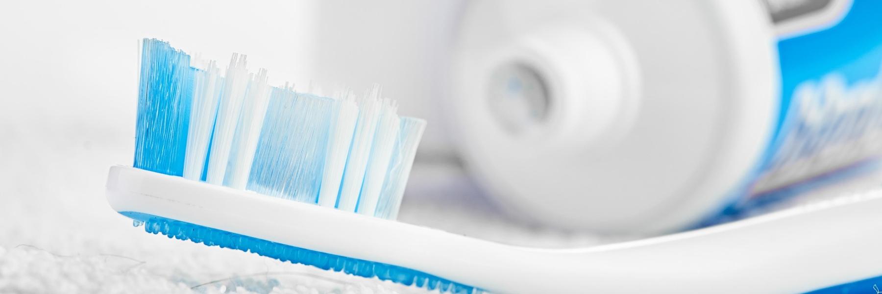 toothbrush with toothpaste | Dentist in white bear lake