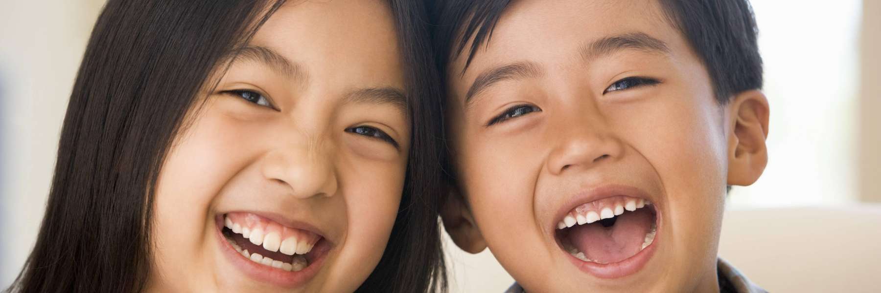 kids smiling with beautiful teeths