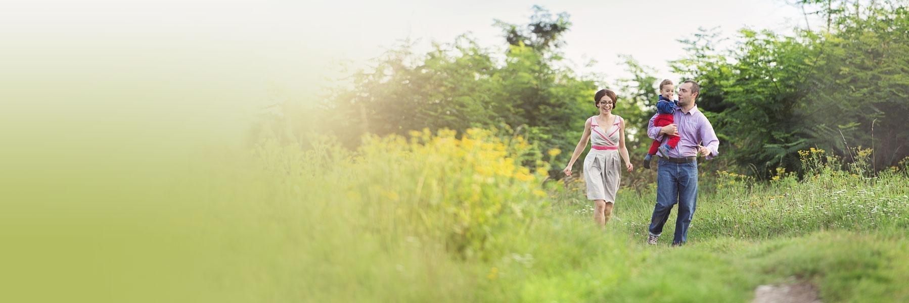 young family in apple orchard l family dentist white bear lake