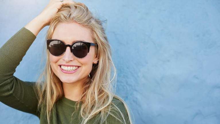 blonde woman with sun glasses