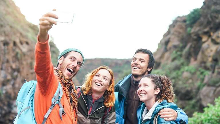 group of four people hiking | emergency dentist white bear lake