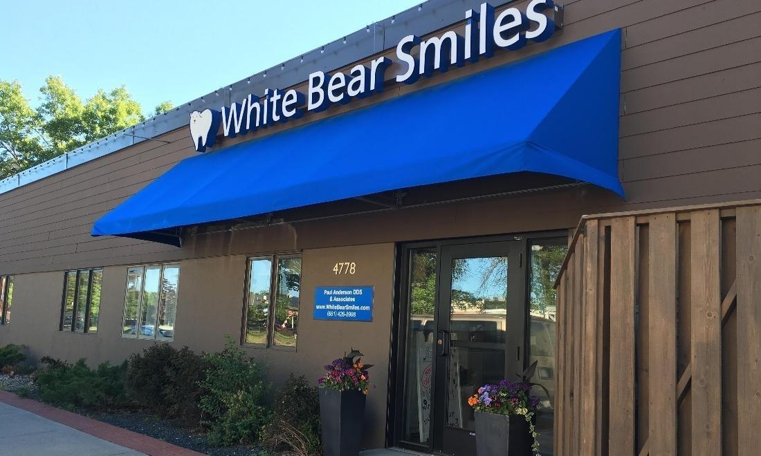 The exterior of White Bear Smiles | Blue awning in White Bear Lake, MN